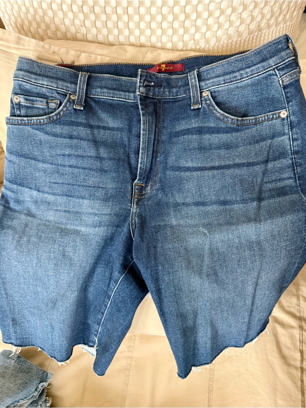 Woman’s longer Frezh Wash Denim Cutoff Jean Shorts.